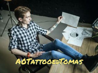 A0TattooedTomas